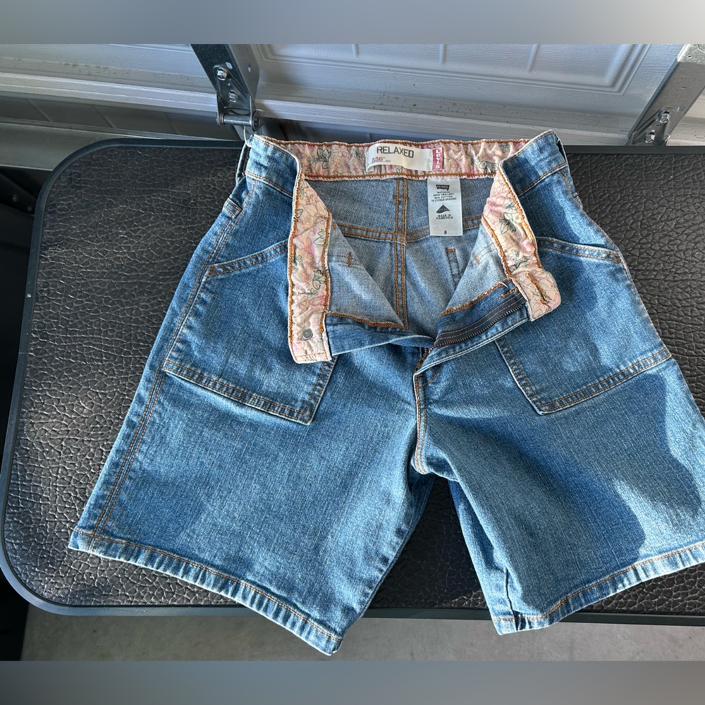 Vintage Levi's Light Blue Jean Shorts with floral waistband , deep pockets